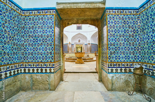 The tiled corridor in Ganjali Khan Bathhouse, Kerman, Iran photo