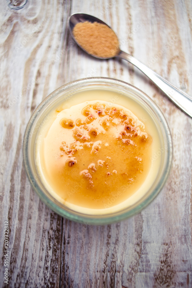 Creme brulee with cane sugar teaspoon Creme brulee with cane sugar teaspoon
