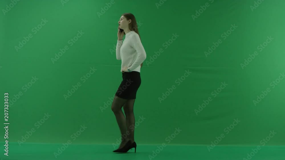 the girl talks on the phone and goes to the right side, in the end she turns and goes back the girl talks on the phone and goes to the right side, in the end she turns and goes back
