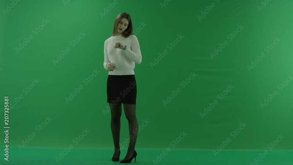 girl waiting for someone on green screen girl waiting for someone on green screen