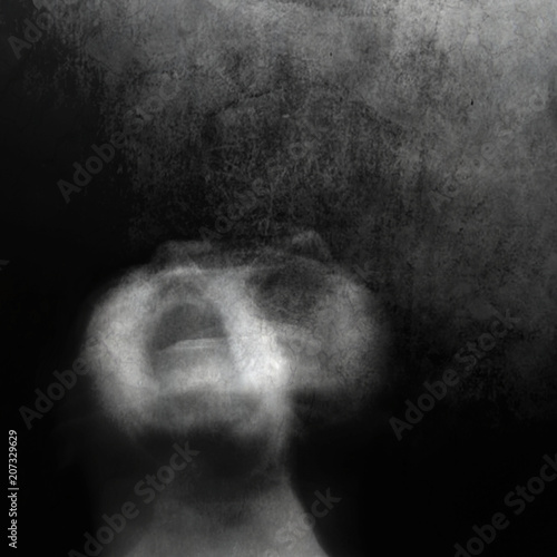 Fotografia Scream of horror. Screaming woman face. Shot with long exposure.