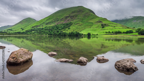 Lake and green hills in Dis...