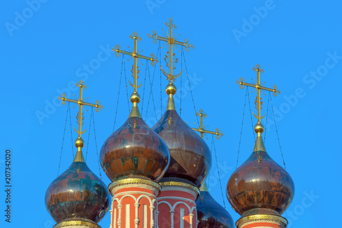 Ancient domes of the Orthodox Russian Church with crosses photo