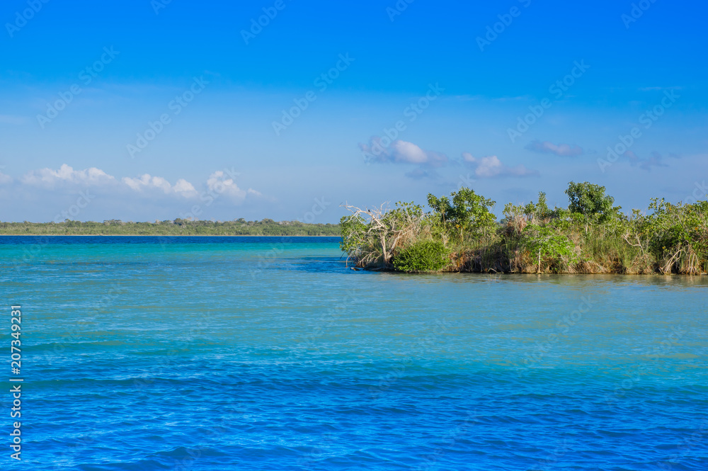 Laguna de Bacalar Lagoon in Mayan Mexico at Quintana roo, seven color lake Laguna de Bacalar Lagoon in Mayan Mexico at Quintana roo, seven color lake