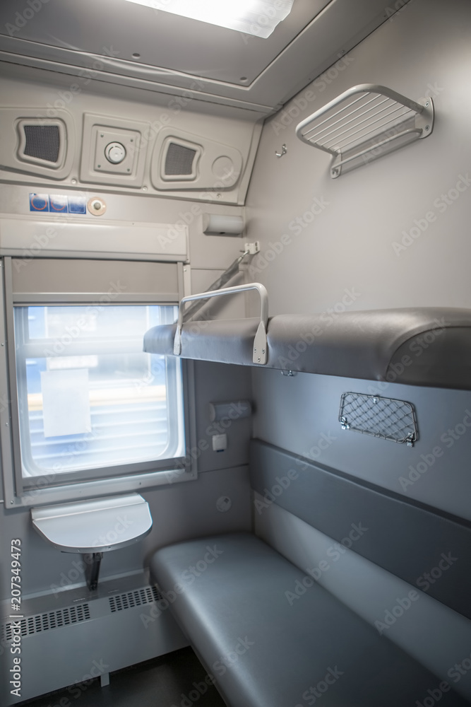 classic interior of sleeping car of train. interior of compartment car. Passenger train car. Sleeping car of passenger train classic interior of sleeping car of train. interior of compartment car. Passenger train car. Sleeping car of passenger train