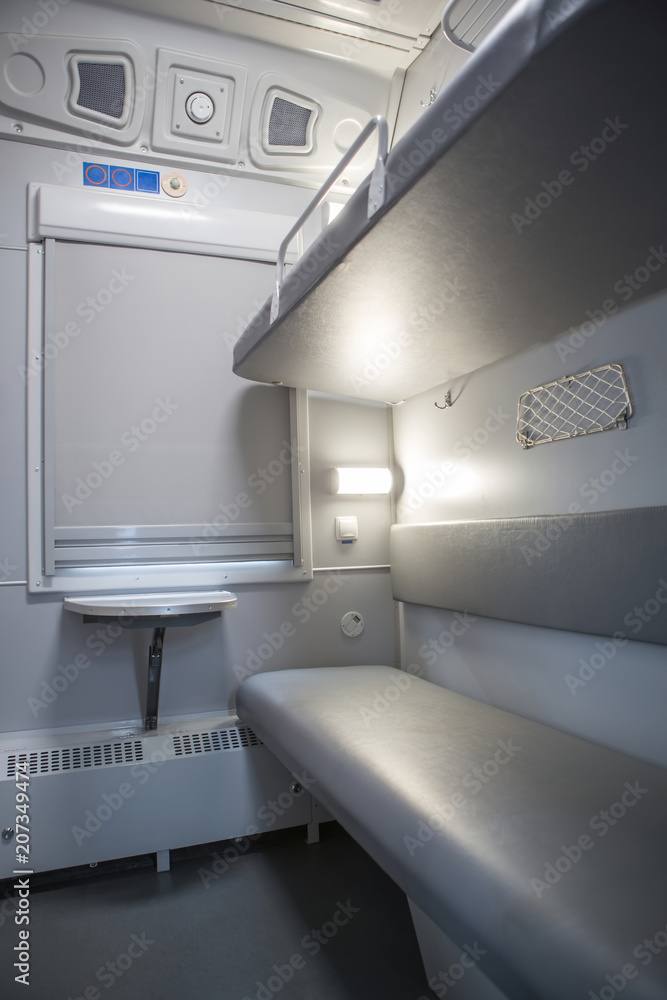 classic interior of sleeping car of train. interior of compartment car. Passenger train car. Sleeping car of passenger train classic interior of sleeping car of train. interior of compartment car. Passenger train car. Sleeping car of passenger train