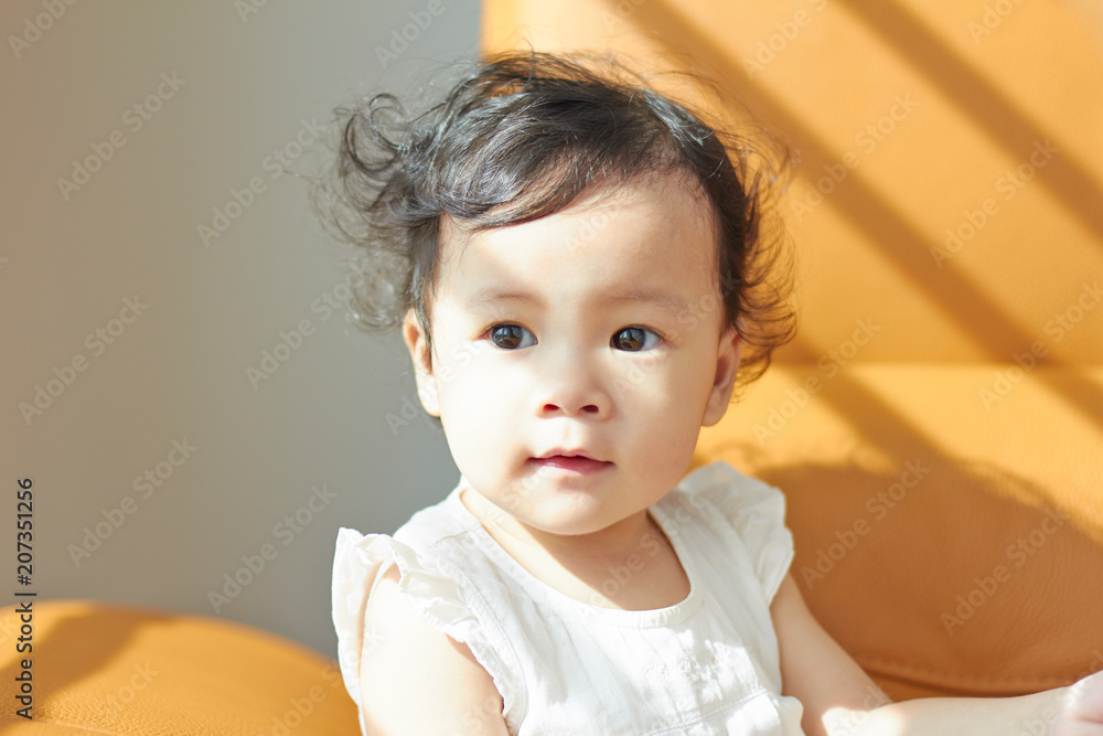 Portrait of cute and lovely curly hair asian chinese baby girl . Stock Photo | Adobe Stock Portrait of cute and lovely curly hair asian chinese baby girl . Stock Photo | Adobe Stock