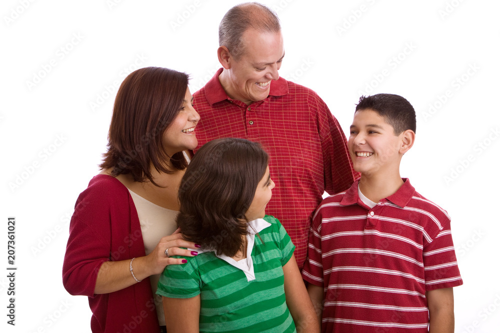 Hispanic family smiling isolated on white. Hispanic family smiling isolated on white.