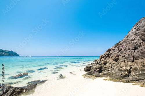 Beautiful white sand beach with island in summer time concept travel, holiday and vacation. Tropical paradise beach nature landscape in Thailand