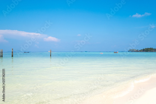 Beautiful white sand beach with soft ocean wave in summer time concept travel  holiday and vacation. Tropical paradise beach nature landscape at Lipe island in Thailand