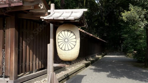 a paper lantern with royal emblem at meiji jingu shrine in tokyo, japan photo