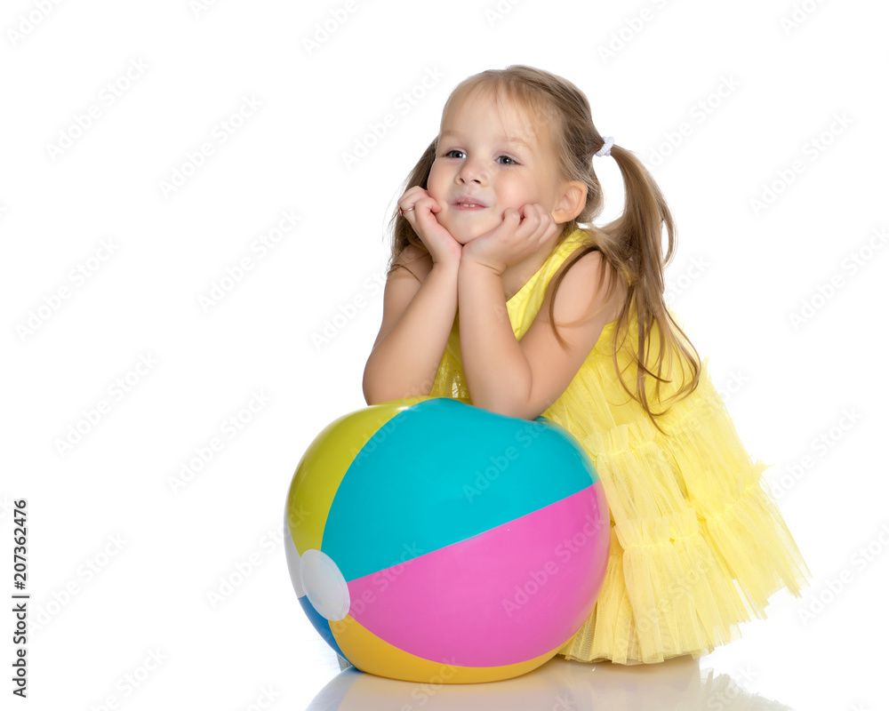 Little girl is playing with a ball Little girl is playing with a ball