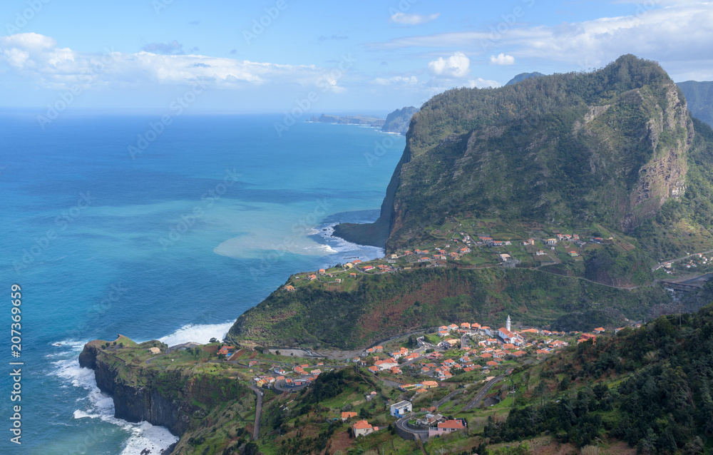 Eagle rock (Penha de Águia) and Faial small parish. Madeira Island, Portugal. Year 2018.