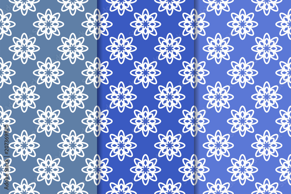 Set of floral ornaments. Vertical blue seamless patterns Set of floral ornaments. Vertical blue seamless patterns