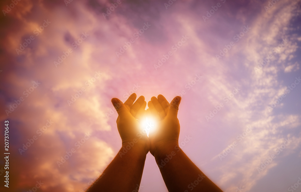 Fototapeta premium Christian man with open hands worship christian. Eucharist Therapy Bless God Helping Repent Catholic Easter Lent Mind Pray. Christian concept background.