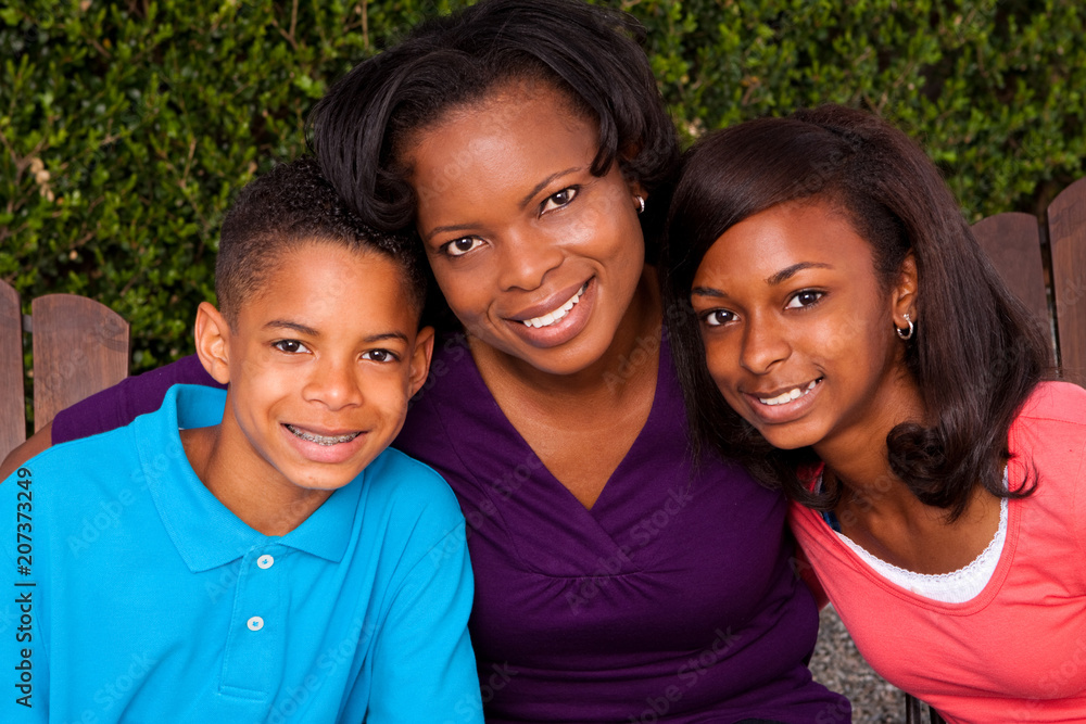 African American mother and her children. African American mother and her children.