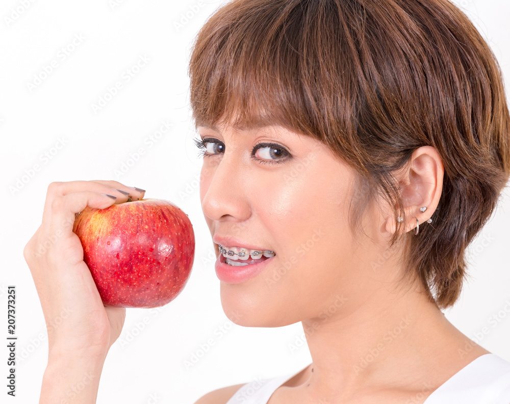Beautifulyoung Asia woman with healthy food. Isolated on white background. Studio lighting. Concept for healthy. Beautifulyoung Asia woman with healthy food. Isolated on white background. Studio lighting. Concept for healthy.
