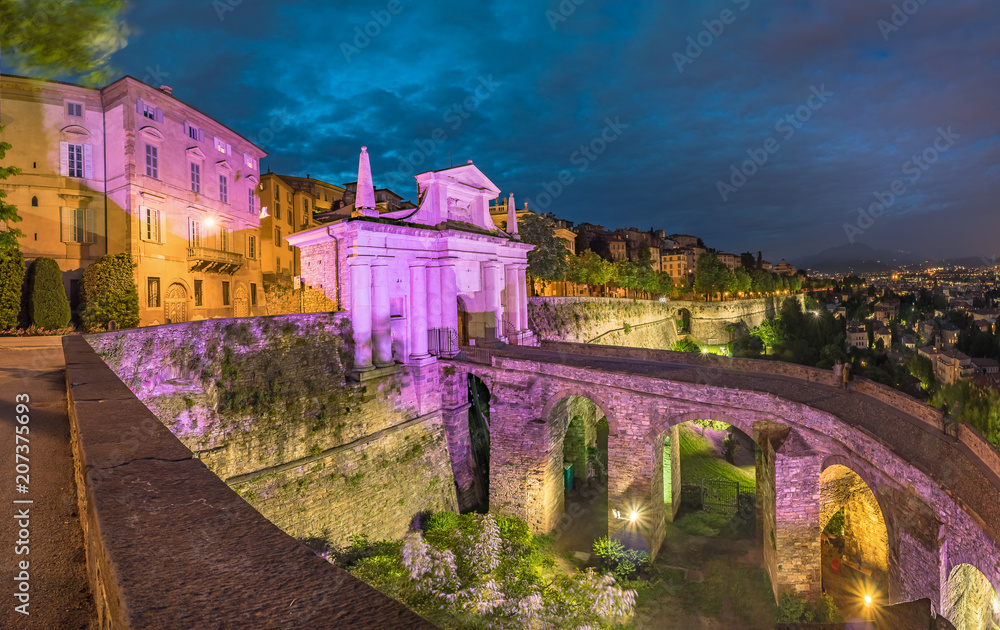 Panoramic view of Bergamo (Italy),the venetian walls and San Giacomo gate at night