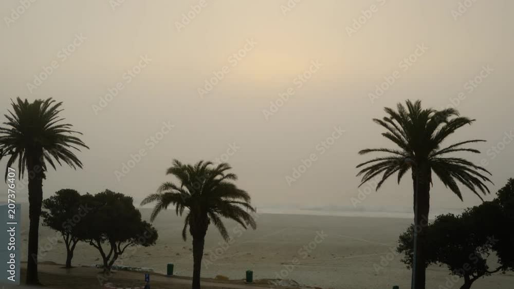 foggy sunset on the beach foggy sunset on the beach