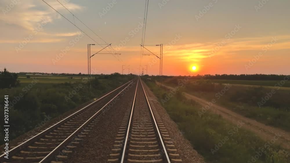 Old railway track with electric powerline poles. Old railway track with electric powerline poles.