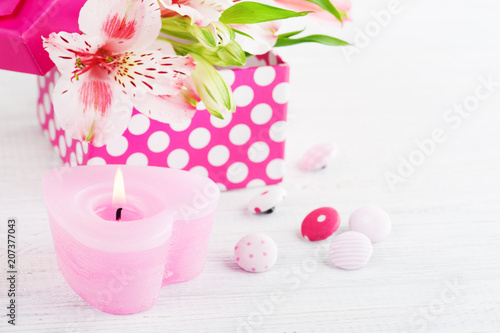 Pink lilly flowers with gift box