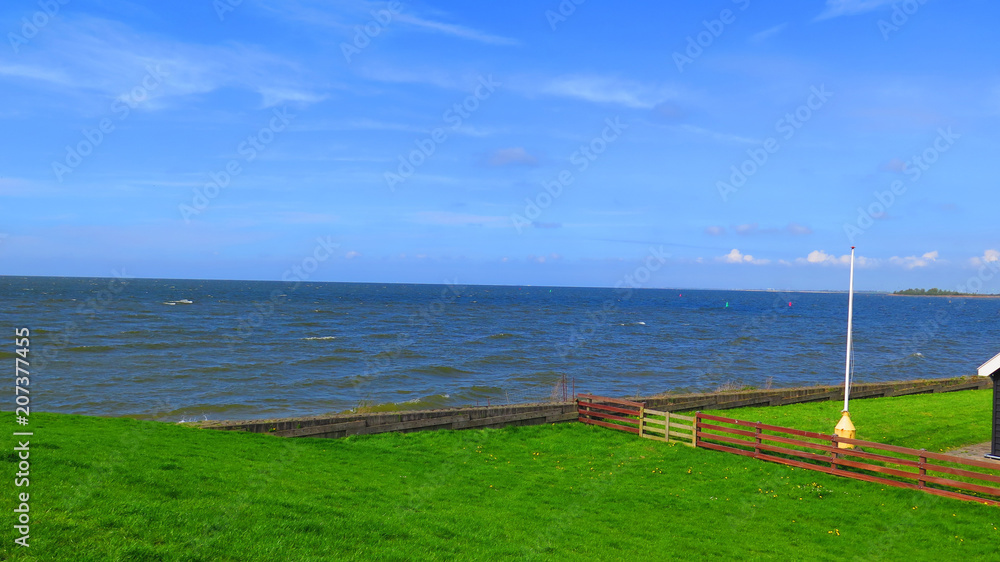 Inland sea and dike in Dutch fishing village