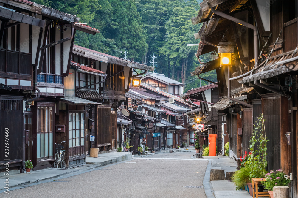 Narai-juku, Japan - September 4, 2017: Picturesque view of old Japanese town with traditional wooden architecture. Narai-juku post town in Kiso Valley, Japan
