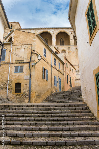 Fototapeta Naklejka Na Ścianę i Meble -  Mallorca, Narrow stairway through old town of Arta upstairs to cathedral