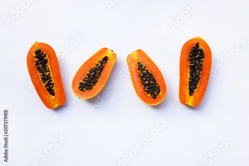 Papaya on white. Copy space