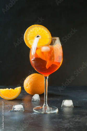 Classic italian aperol spritz cocktail on dark.