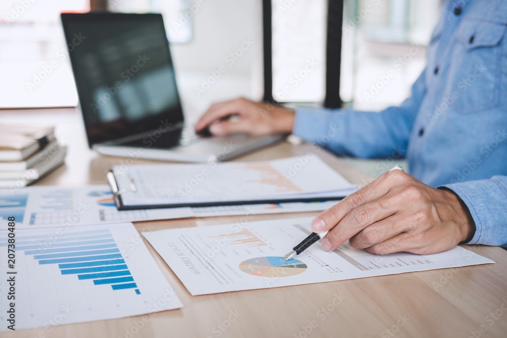Businessman working analysis finance with calculate about cost on investment, planning data on document, business strategy and accounting concept Businessman working analysis finance with calculate about cost on investment, planning data on document, business strategy and accounting concept