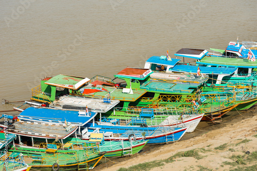 BAGAN, MYANMAR - DECEMBER 1, 2016: Boats at the beach. Copy space for text. photo