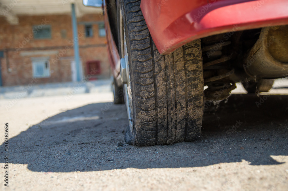 Naklejka premium flat tire in the car