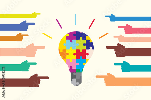 多様性とアイディアを表すカラフルな電球と手 Diversity and creativity shown by puzzle bulb