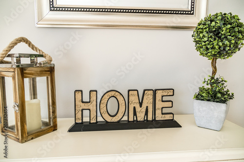 Slika na platnu Home Decor on a table with a plant and candle