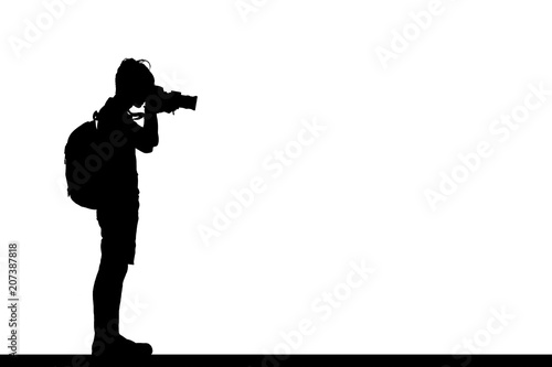 Silhouette of photographer with his camera on white background.