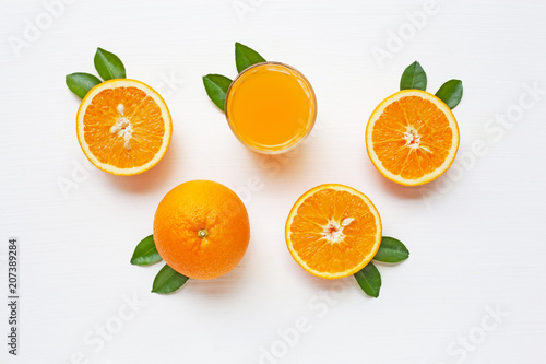 Fresh orange citrus fruit with leaves isolated on white