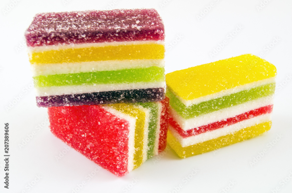 Sliced multicolored marmalade on a light background Sliced multicolored marmalade on a light background