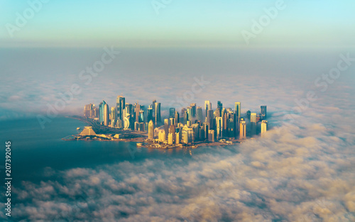 Aerial view of Doha through the morning fog - Qatar, the Persian Gulf