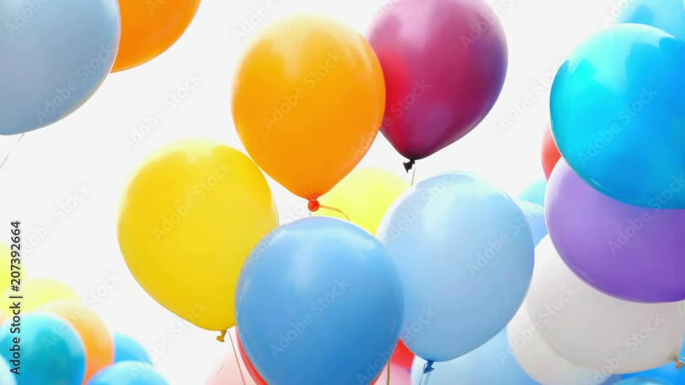 Festive color helium balloons.
Festive color helium balloons.