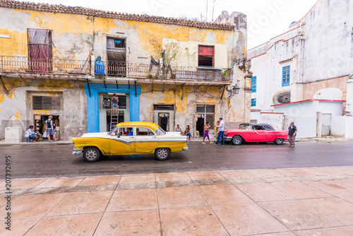 CUBA, HAVANA - MAY 5, 2017: American retro cars on city street. Copy space for text. © ggfoto