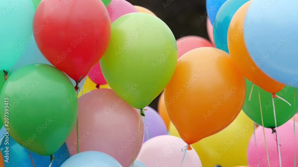 Festive color helium balloons.
Festive color helium balloons.