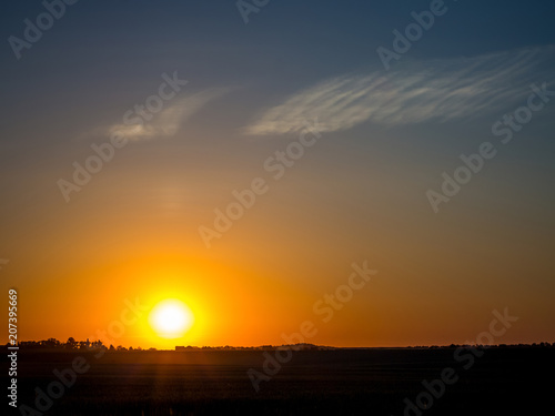 Sunrise in field. Countryside in morning. Dramatic sky during sunrise © Volodymyr