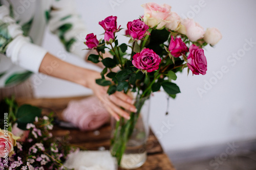 Florist makes a bouquet.