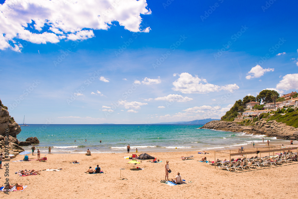 SALOU, SPAIN - JUNE 6, 2017: Coastline Costa Dorada, beach in Salou, Tarragona, Catalunya, Spain. Copy space for text.