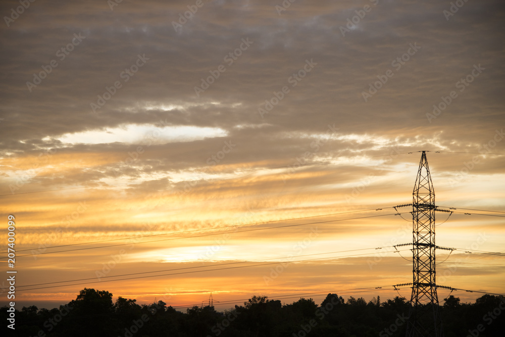 Electricity on sunrise background.