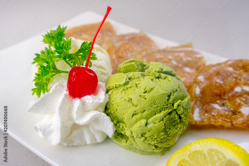 Green Tea and Vanilla Ice Cream with fried sliced banana Green Tea and Vanilla Ice Cream with fried sliced banana