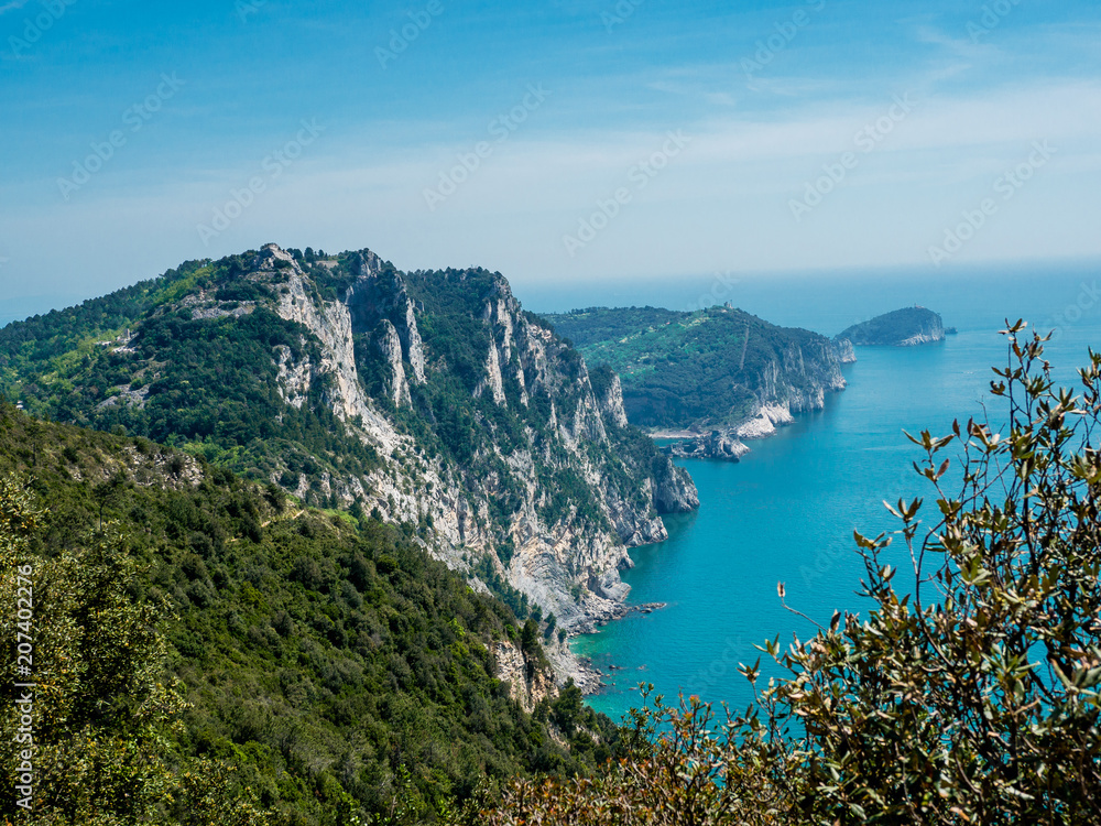 Fototapeta premium A view along the cliffs past Portovenere to Palmaria, Tino and Tinetto