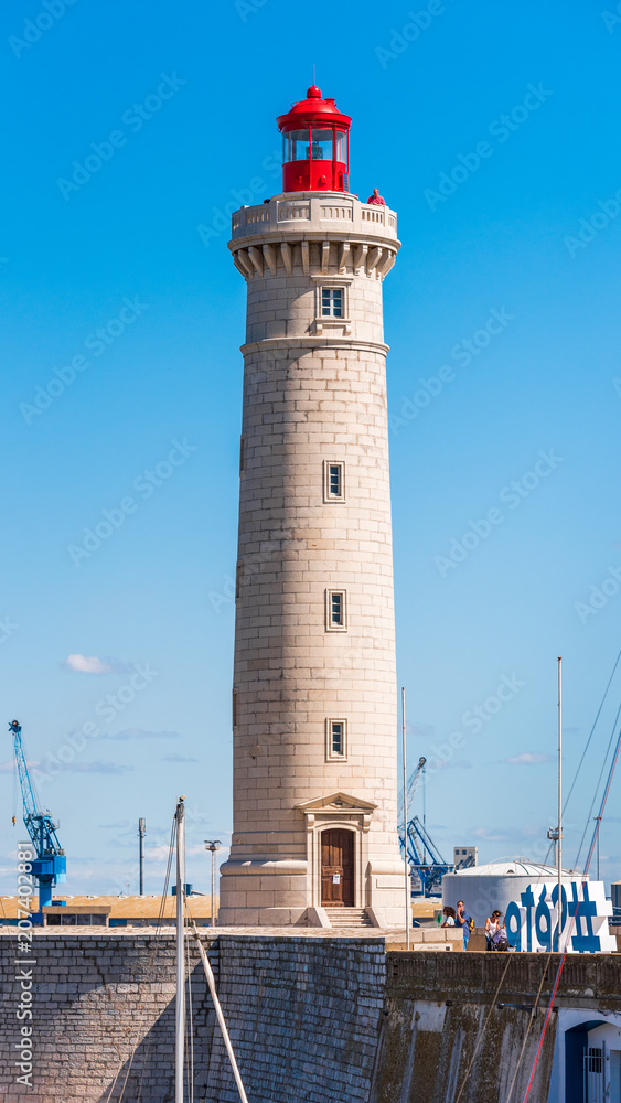 SETE, FRANCE - SEPTEMBER 10, 2017: Stunning harbour of Sete with lighthouse in the south of France near the Mediterranean. Copy space for text. Vertical.