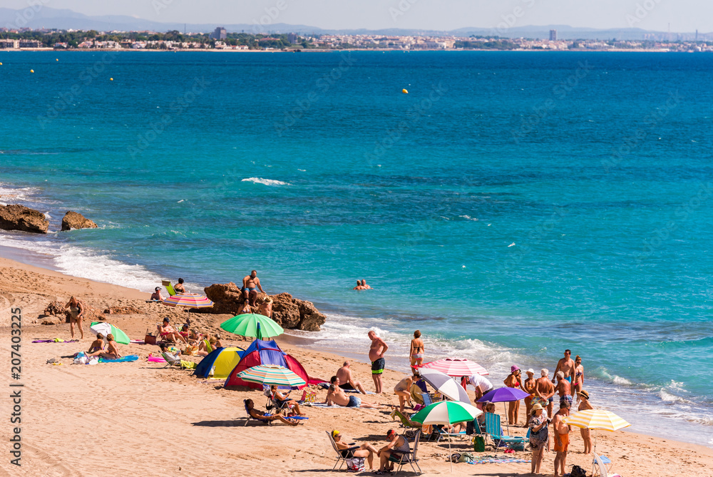 MIAMI PLATJA, SPAIN - SEPTEMBER 13, 2017: View of the sandy beach Mont-roig del Camp. Copy space for text. MIAMI PLATJA, SPAIN - SEPTEMBER 13, 2017: View of the sandy beach Mont-roig del Camp. Copy space for text.